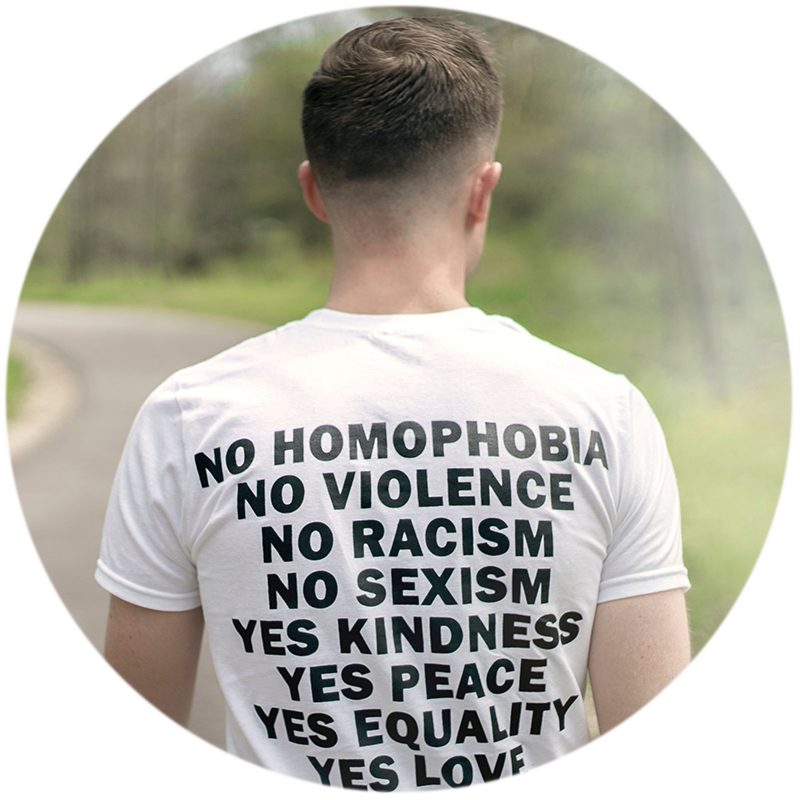 T-shirt that says No homophobia, no violence, no racism, no sexism, yes kindness, yes peace, yes equality, yes love